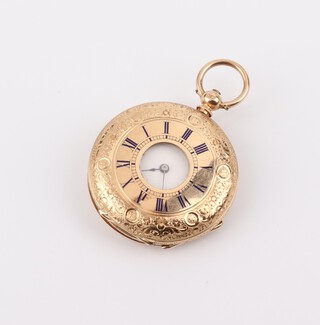 A lady's 14ct yellow gold key wind, half hunter, fob watch with engraved floral back, contained in a 35mm case 