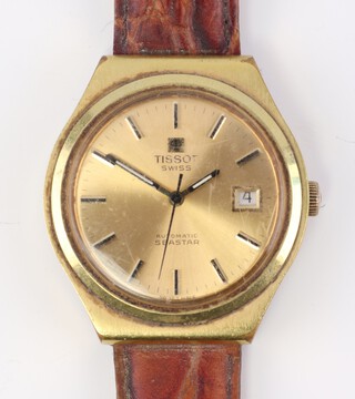A gentleman's gilt cased Tissot Seastar calendar wristwatch contained in a 35mm case on a leather strap, with International guarantee and box 