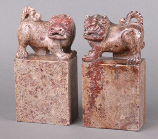 A pair of carved soapstone seals surmounted by Shi Shi 20cm 