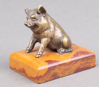 A bronze figure of a seated pig on a hardstone base 6cm 