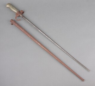 An 1866 Eppe Lebel bayonet complete with scabbard, the hook to the bayonet marked 53030 