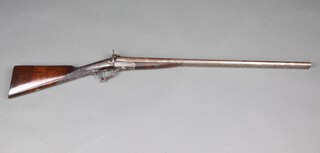 T E Kither of Sevenoaks, a 19th Century double barrelled pin fire shotgun with 75cm steel barrel and chased swan neck hammers