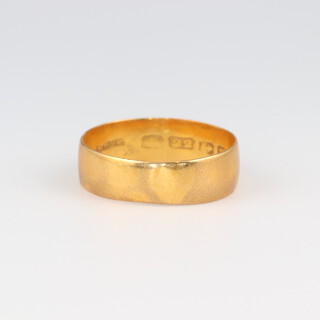 A 22ct yellow gold wedding band, size K, 2.3 grams 