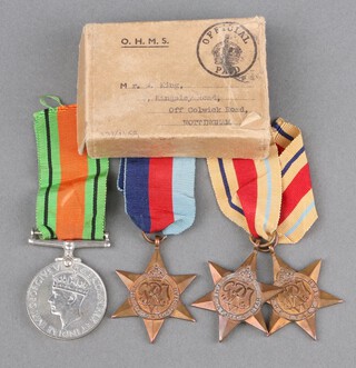 A group of 4 Second World War medals to W King comprising 1934-45 Star, Africa Star, Italy Star and British War medal, with posting box 