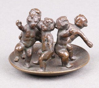 A 19th Century bronze group of 5 cavorting children in a circular shallow dish 5cm 