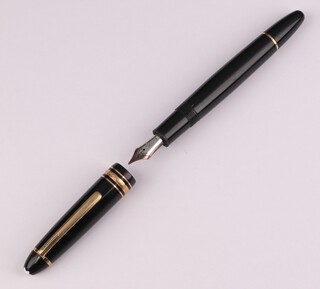 A Mont Blanc fountain pen, the cap numbered HH1009615 with a 14ct white gold nib 