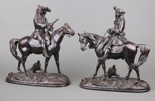 A pair of 19th Century spelter figures of mounted cavaliers, raised on oval bases 36cm x 30cm x 12cm 