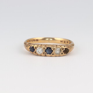 A 9ct yellow gold sapphire and diamond ring, size L, 2.6 grams 