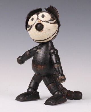 Schoenhut, a 1920's wooden Felix The Cat puppet in black with articulated limbs, 20cm 