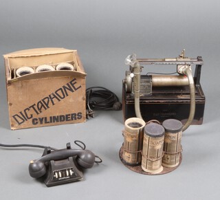 The Dictaphone Company Ltd cylinder recorder and 6 cylinders, boxed, together with a metal stand and a telephone 