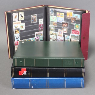 A blue stock book of GB mint and used pre-decimal stamps , a ditto black stock book of Commonwealth mint and used stamps - Aiden, Brunei, Gibraltar, India, an album of mint and used Australian stamps, and a collection of New Zealand mint and used stamps, all George V to Elizabeth II 