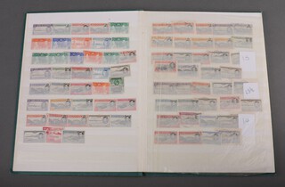A stock book of mint and used Ascension Island stamps George V to Elizabeth II 