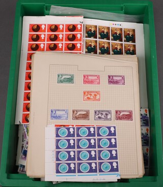A collection of George V Commonwealth mint and used stamps including St Helena, Fiji, Montserrat and a collection of George VI and Elizabeth II mint stamps 