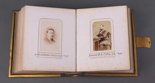 A Victorian leather bound photograph album 16cm x 19cm x 5cm, containing 48 black and white portrait photographs, including Colonel George Henry Robertson CB, ADC to Queen Victoria and other members of the Robertson family 