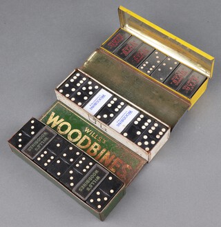 A rectangular Old Holborn dominoes tin containing a set of Wills Star Cigarettes plastic promotional dominoes together with 2 sets of Wills Woodbine promotional dominoes in rectangular pressed metal boxes 