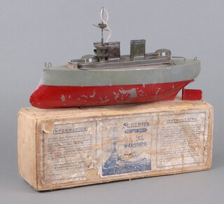 An early boxed tin plate Sutcliffe steam driven model war ship in grey and red 31cm x 10cm 