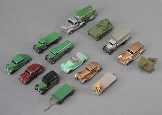 Dinky Toys, a collection of mainly closed chassis vehicles to include 25C flat truck in green, 25B covered wagon in grey, 25D petrol tanker in green, 14A BEV truck in grey, 42A Riley saloon in green with black hubs, 36C Humber Vogue (mould chassis repainted in gold), 39A Packard Super 8 Tourer (repainted gold), 40D Austin Devon maroon body and hubs, 36G Taxi (in green and black moulded chassis), 38E Armstrong Siddeley in pale green, together with a trailer, tank, field gun and  Timpo pick up truck 