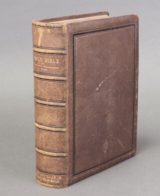 The miniature Quarto Bible by S Baxter and Sons, bound in tooled brown Morocco, spine with raised bands and gilt, black paste down, family history to 3 end papers, pencil notes to title page