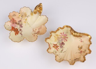 A Royal Worcester blush ivory and floral patterned scallop shaped dish, the reverse with purple mark, 2 dots  and 1413 13cm, together with a similar handled dish with purple mark, 3 dots and 1404