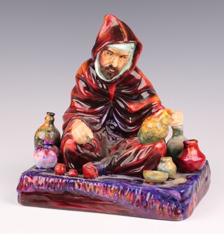 A Royal Doulton figure of a potter HN1493 