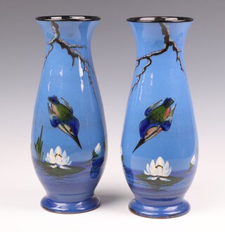 A pair of unmarked Bretby style blue glazed pottery vases decorated diving kingfishers 30cm 