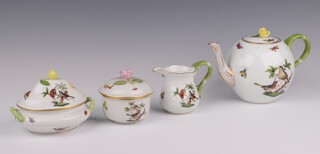 A Herend 18th Century style 3 piece porcelain tea service decorated bird and butterflies with teapot 1604/RO 51 (minor chip to rose finial) 9cm, milk jug 1644/RO 64 and twin handled lidded sugar bowl, bases marked 6017/RO 21, together with a circular dish and cover decorated butterflies and with a rose finial 9cm 