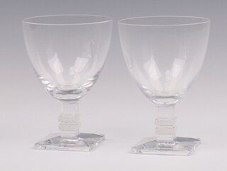 A pair Lalique Argos wine glasses on square bases 11cm boxed, 