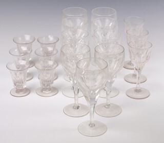 Nine Villeroy and Boch faceted glass wine glasses, 3 similar liqueur glasses and 6 19th Century panel cut liqueur glasses on circular feet 