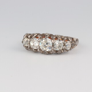 An 18ct yellow gold graduated 5 stone diamond ring 1.2ct, size Q, 4.6 grams 