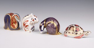 Four Royal Crown Derby Imari pattern paperweights - snake LII 9cm with gold stopper, squirrel LIII silver stopper, tortoise LI gold stopper and badger (second) 