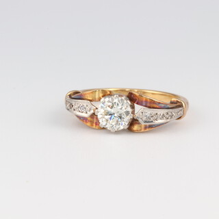 An 18ct yellow gold diamond ring, the centre stone 0.75ct, the 6 shoulder diamonds 0.02ct, size K, 3.9 grams 