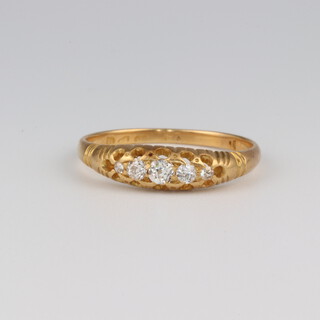 An 18ct yellow gold 6 stone diamond ring 0.25ct, size Q, 2.6 grams
