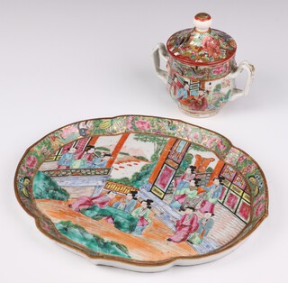 A late 19th Century Chinese famille rose quatrefoil shaped dish with figures on pavilion terraces 27cm together, with a ditto 2 handled cup and cover 12cm