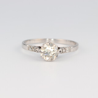 An 18ct white gold single stone diamond ring, the centre stone 1ct, the diamond shoulders approx. 0.03ct, size R, 1.9 grams 