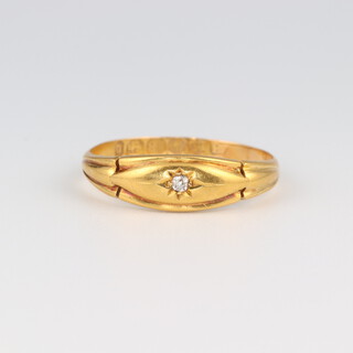 An 18ct yellow gold single stone diamond ring approx. 0.02ct, size Q, 2.6 grams