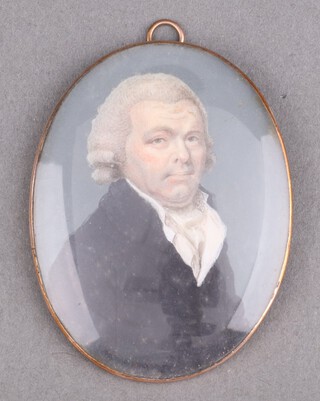 An early 19th Century oval watercolour on ivory,  portrait miniature of a gentleman with a black coat 6cm x 5cm Ivory Exemption Certificate SU7MPG2Z