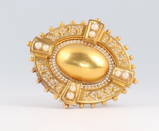 A Victorian 14ct yellow gold Etruscan style brooch set with 8 seed pearls, 15.5 grams gross, 52mm 