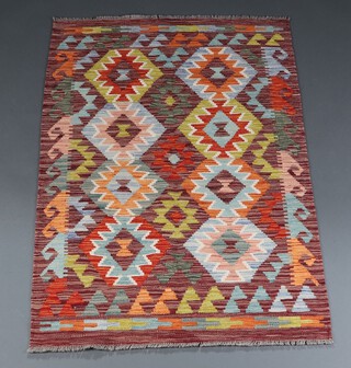 A tan, green and white ground Chobi Kilim rug with diamond design 152cm x 100cm 