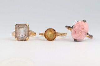 Three 9ct yellow gold rings including a quartz, citrine and carved coral, sizes H, R and P, 8. 2grams 