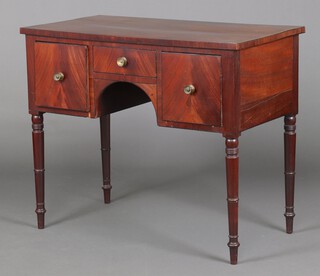 A Georgian mahogany sideboard fitted 1 long and 2 short drawers with an arched shaped apron, raised on turned supports 80cm h x 96cm w x 51cm d 
