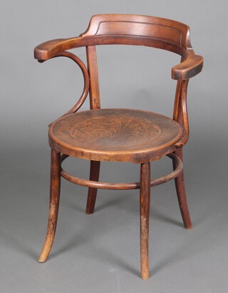 An Austrian bentwood open arm chair 81cm h x 60cm w x 48cm d (seat 29cm x 36cm), the base with old label marked Mundus 