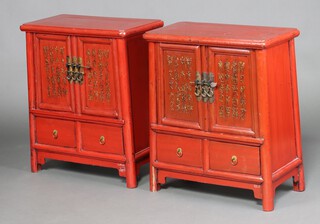 A pair of 19th/20th Century Chinese lacquered cabinets enclosed by panelled doors above 2 long drawers 76cm h x 36cm w x 35cm d 