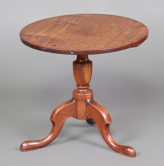 A 19th Century circular mahogany wine table, raised on a bulbous turned column and tripod base 50cm h x 55cm diam. 