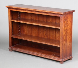 A 20th Century solid oak open bookcase, fitted adjustable shelves 80cm h x 120cm w x 32cm d 