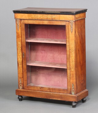 A Victorian walnut inlaid and ebonised pier cabinet, fitted 2 plush lined shelves enclosed by glazed panelled doors, gilt metal mounts to the sides, raised on bun feet 103cm h x 76cm w x 31cm d  
