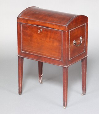 A 19th Century rectangular domed mahogany cellarette with fitted interior and brass drop handles to the sides, raised on square tapered supports with brass casters 67cm h x 43cm w x 29cm d 