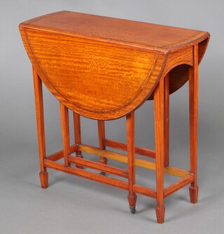 An Edwardian oval inlaid satinwood tea table, raised on square tapered supports, spade feet 70cm h x 73cm w x 28cm d 