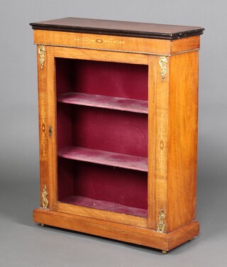 A Victorian bleached and inlaid walnut pier cabinet, fitted plush lined shelves enclosed by a panelled door, having gilt metal mounts throughout  97cm h x 76cm w x 29cm d 
