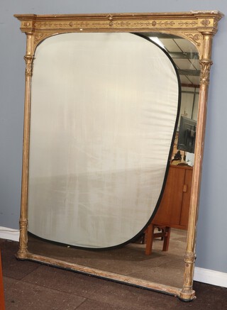A 19th Century arched plate over mantel mirror contained in a gilt painted plaster frame having fluted columns to the sides 166cm h x 136cm w x 11cm d 