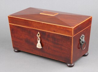 A Georgian inlaid mahogany twin compartment tea caddy of sarcophagus form with hinged lid and ivory escutcheon, the interior with mixing bowl, raised on bun feet 19cm x 31cm x 15cm Ivory Exemption Certificate YM2UE41B